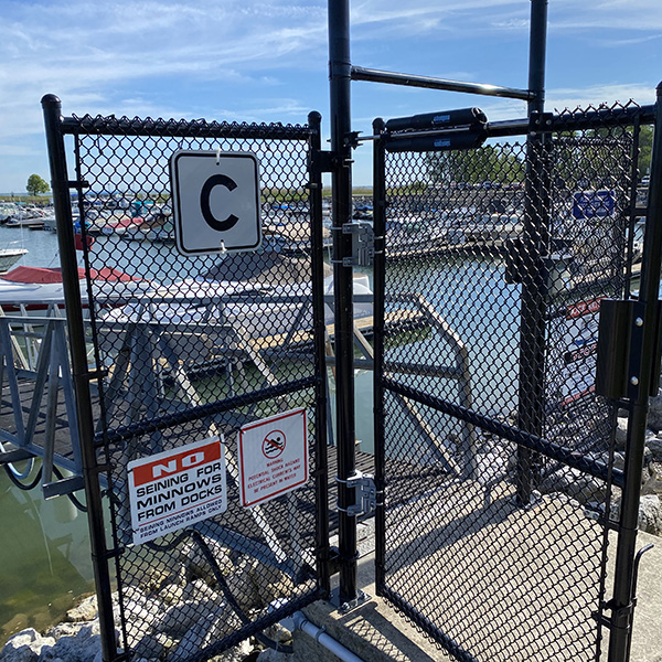 Black Chain Link Fence and gate installation at the marina in Guam