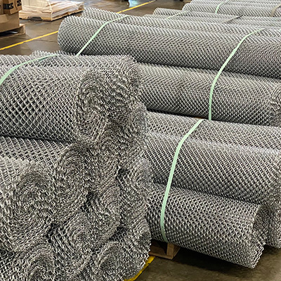 hain Link Fence Mesh Fabric wrapped, ready to be loaded onto a carrier to transport.