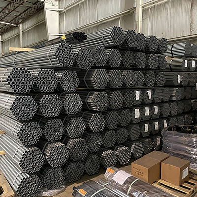 Chain Link Fence posts, pipe, or tubing wrapped in warehouse and ready to be transported on truck to next location.