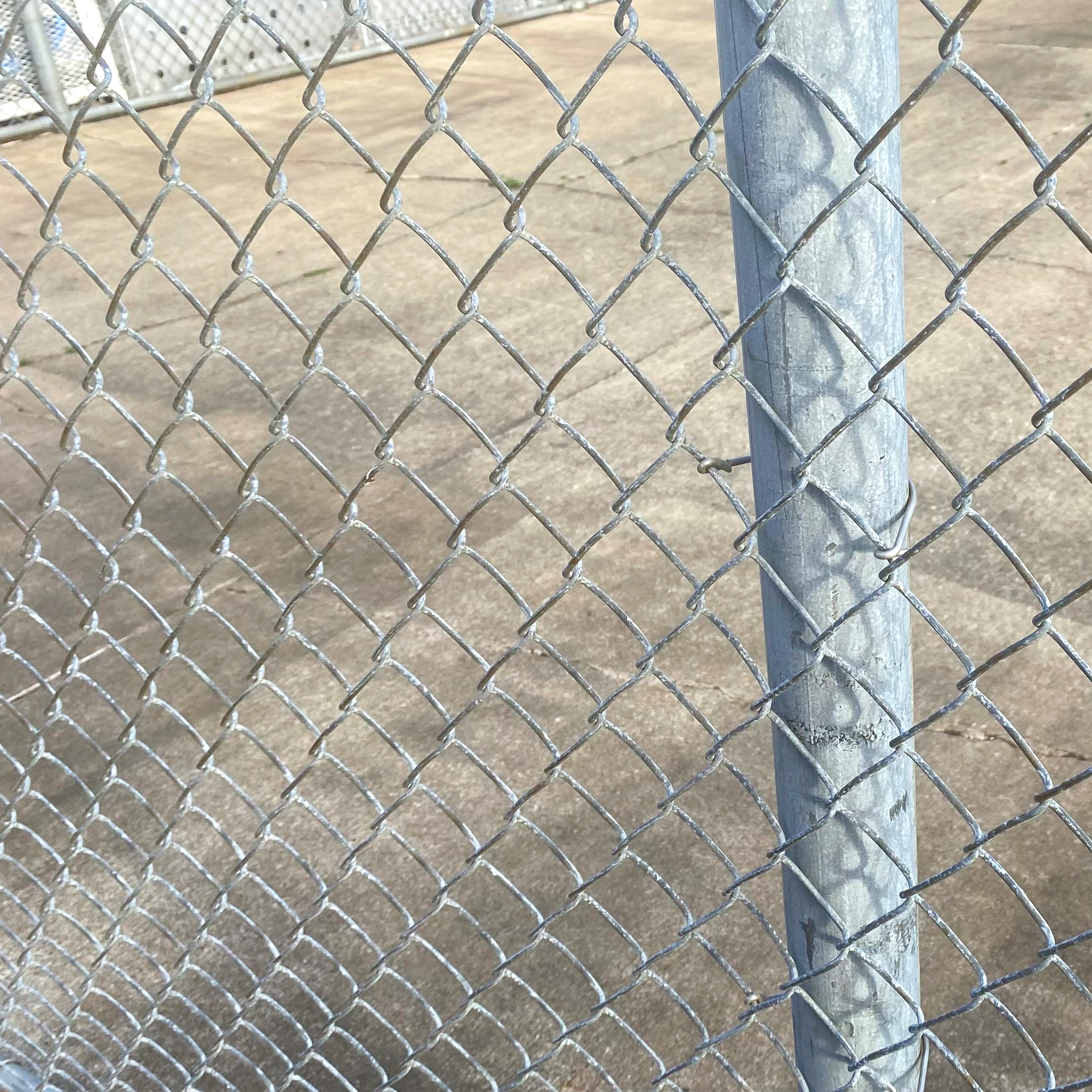 galvanizaed fence fitting installation photo close up