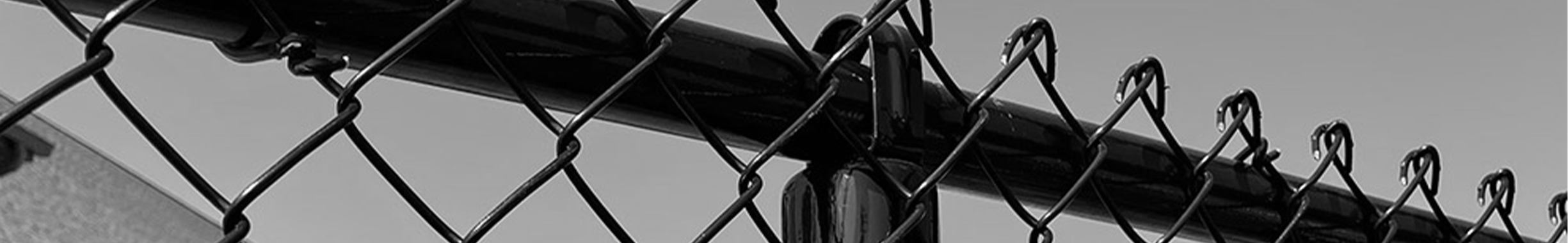 Background image of black chain link fence