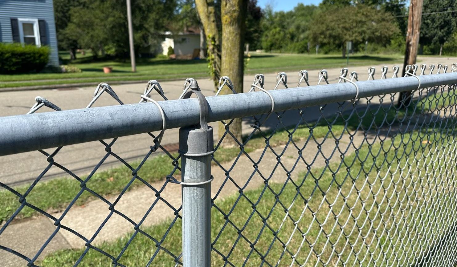 top rail on chain link fence